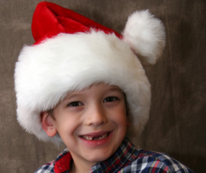 boy wearing santa hat