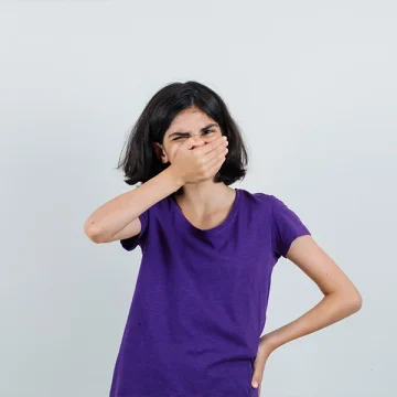 Do Cavities Cause Bad Breath? Signs Parents Should Watch For